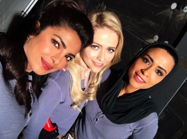 Picture of Yasmine Al Massri with actress Priyanka Chopra and crew member of the series